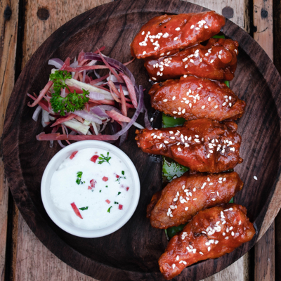plate of chicken wings with feature dip, available at the venue